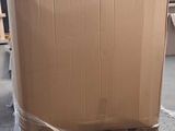 a cardboard box sitting on a pallet in a warehouse