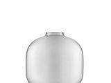 an image of a glass vase with a white base on a white background