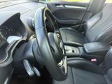 a picture of a car dashboard with a steering wheel
