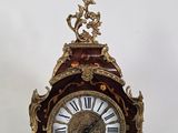 a clock that is sitting on top of a table