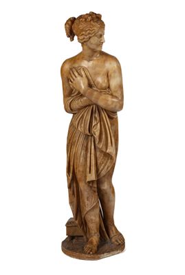 une image représentant une statue d'une femme avec une serviette sur la tête