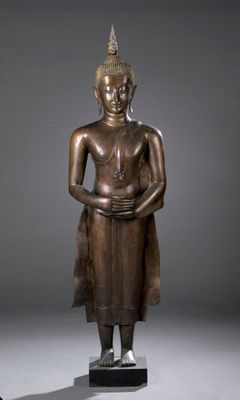 bronze statue of a seated buddha on a black base