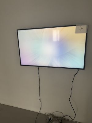 an image of a flat screen tv mounted on a wall