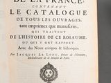 an open book with a black and white title on it