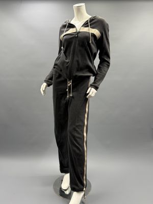 an image of a mannequin wearing a black and gold outfit
