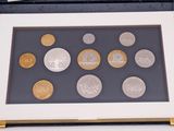 an image of a picture of a display case with a lot of coins in it