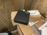 a box that has a small device on top of it