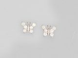 a pair of diamond butterfly earrings