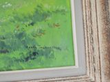 an image of a painting of a green field with trees in the background