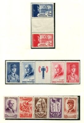 quatre timbres différents, de couleurs et de tailles variées, sur une feuille de papier