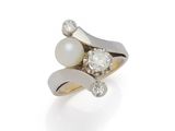 a white pearl and diamond ring