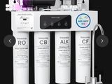 un gros plan d'un filtre à eau muni d'un robinet