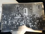 an old black and white photo of a large crowd of people