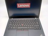the lenovo laptop is open and ready to be used