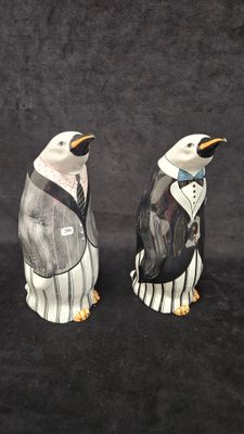 pair of penguin salt and pepper shakers with tuxedo in tuxedo tuxedo suit