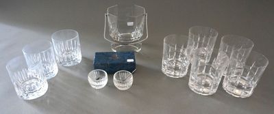 many glasses that are sitting on a table