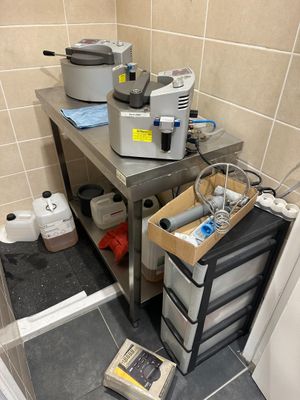a picture of a room with a lot of clutter on the floor