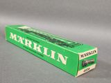 a close up of a box of markin toothpaste on a table