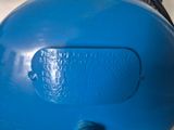 a blue ball that is sitting on top of a table