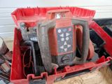 an image of a red tool box with tools in it