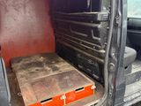 a van that has a bed in the back of it