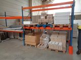 many boxes and boxes on the shelves in the warehouse