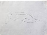 dessin représentant une femme allongée sur le ventre sur une feuille de papier