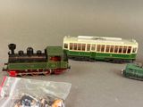 three toy trains that are sitting next to each other on a table