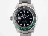 rolex submarine watch with green bezel and black dial