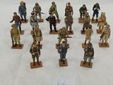 a lot of figurines of military men on display
