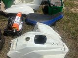 a lot of motorbikes that are sitting in the grass