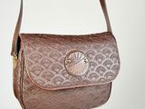brown leather purse with a metal buckle and a metal clasp
