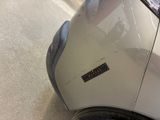 a close up of a car with a sticker on it
