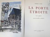 un livre dans lequel figure l'image d'une maison