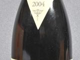 a bottle of wine that is sitting on a table