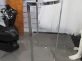 two mannequins and a table in a store