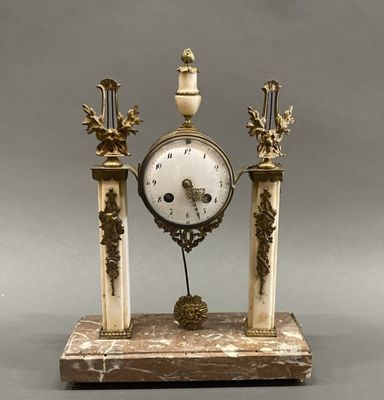 a clock that is sitting on top of a table