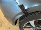 a close up of a car tire with a sticker on it