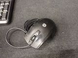 a computer mouse and a keyboard on a desk