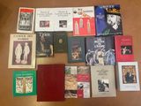 a lot of books that are on the table