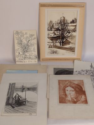 a table with a bunch of drawings and pictures on it