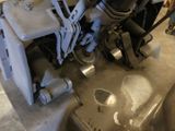 a close up of a motorcycle engine with a skull on it