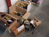 many boxes of assorted items sitting on the floor