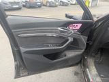 a car door with a pink sticker on it