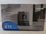 the box of the coffee maker is sitting on the table