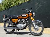 a motorcycle that is parked on the side of the road