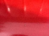 a red chair that is sitting in a room