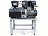 a machine that is sitting on a table with a price tag