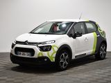 La Citrole est une petite voiture compacte aux couleurs vert vif et blanc.