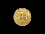 an image of a gold coin on a black background